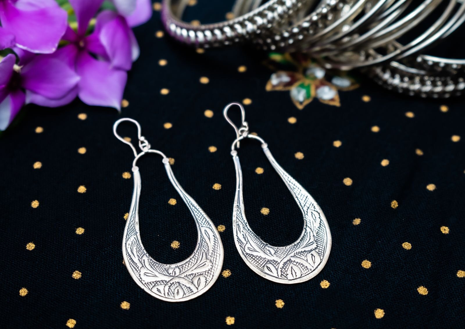 Silver earrings close up