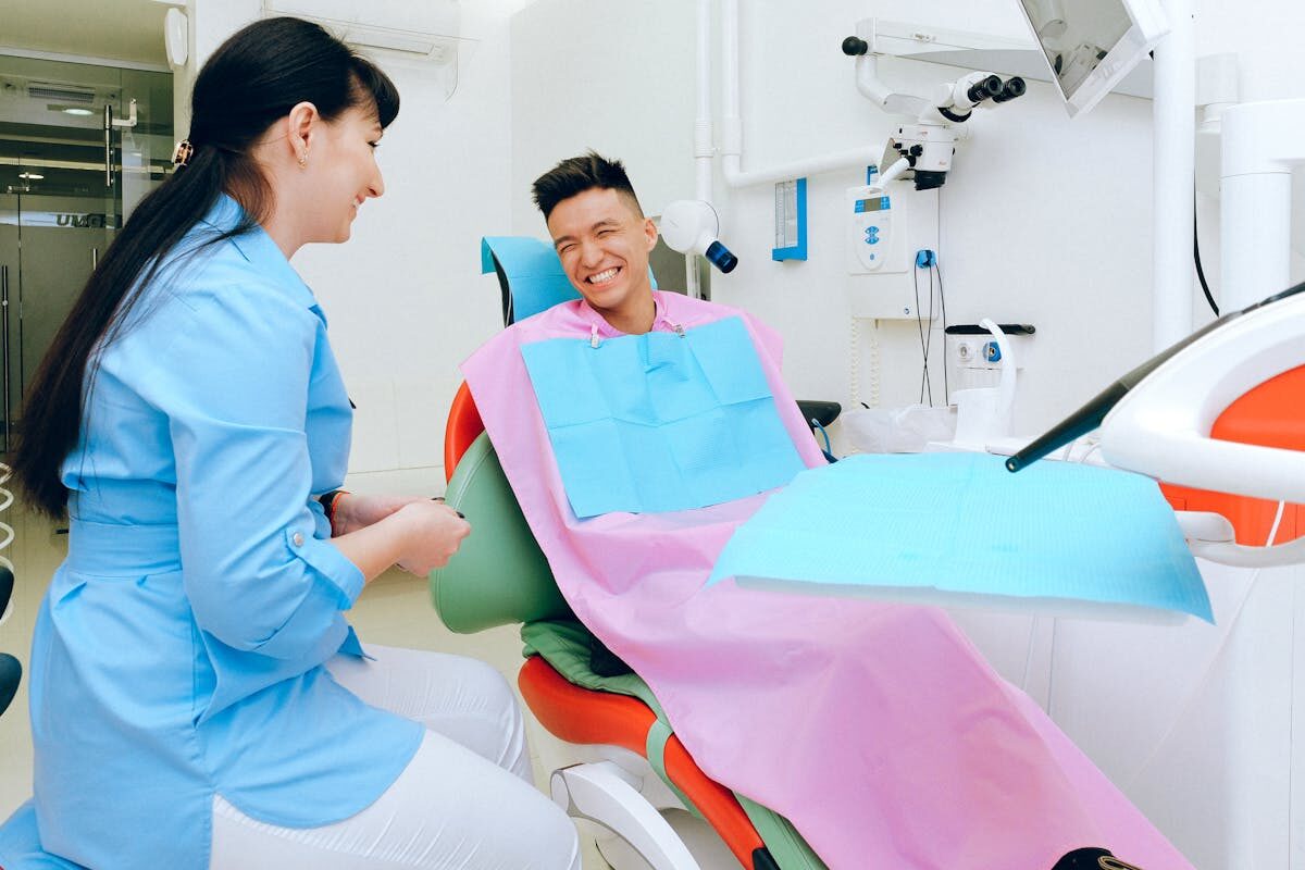 A relaxed, smiling patient in the dental chair